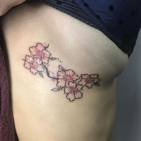 Bold and Sexy: Flower Tattoos on Boobs